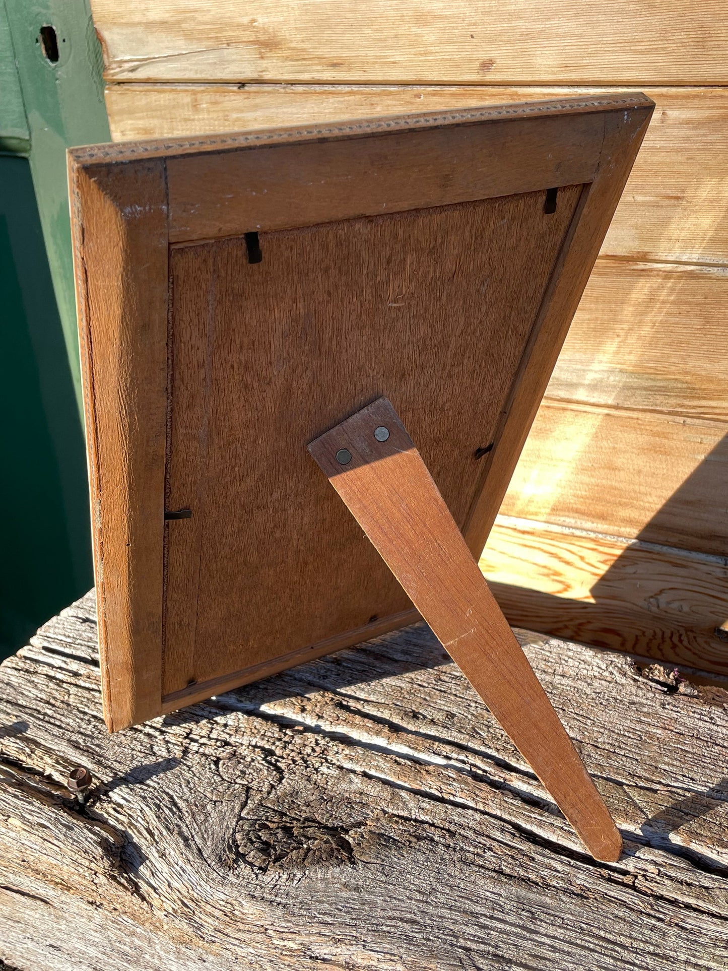A Persian Hand Painted Panel With two Figures Housed in a Vizagapatam Style Easel Frame 31.5cm Tall