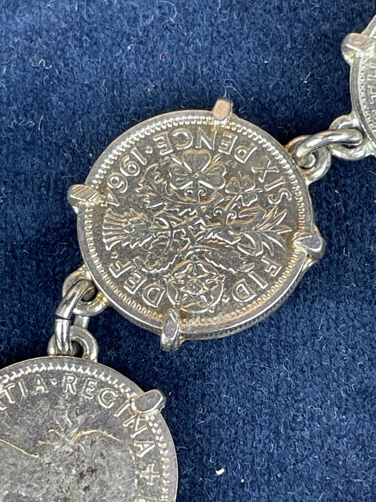 A Child's Charm Bracelet Made From Six Old Sixpence Coins 50's and 60's