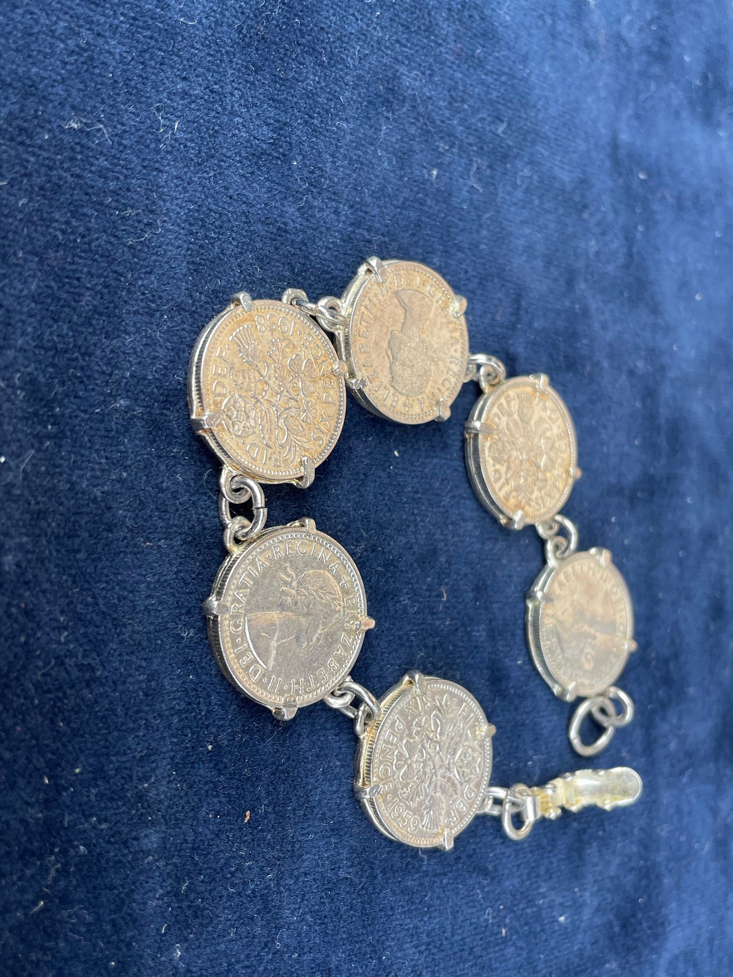 A Child's Charm Bracelet Made From Six Old Sixpence Coins 50's and 60's