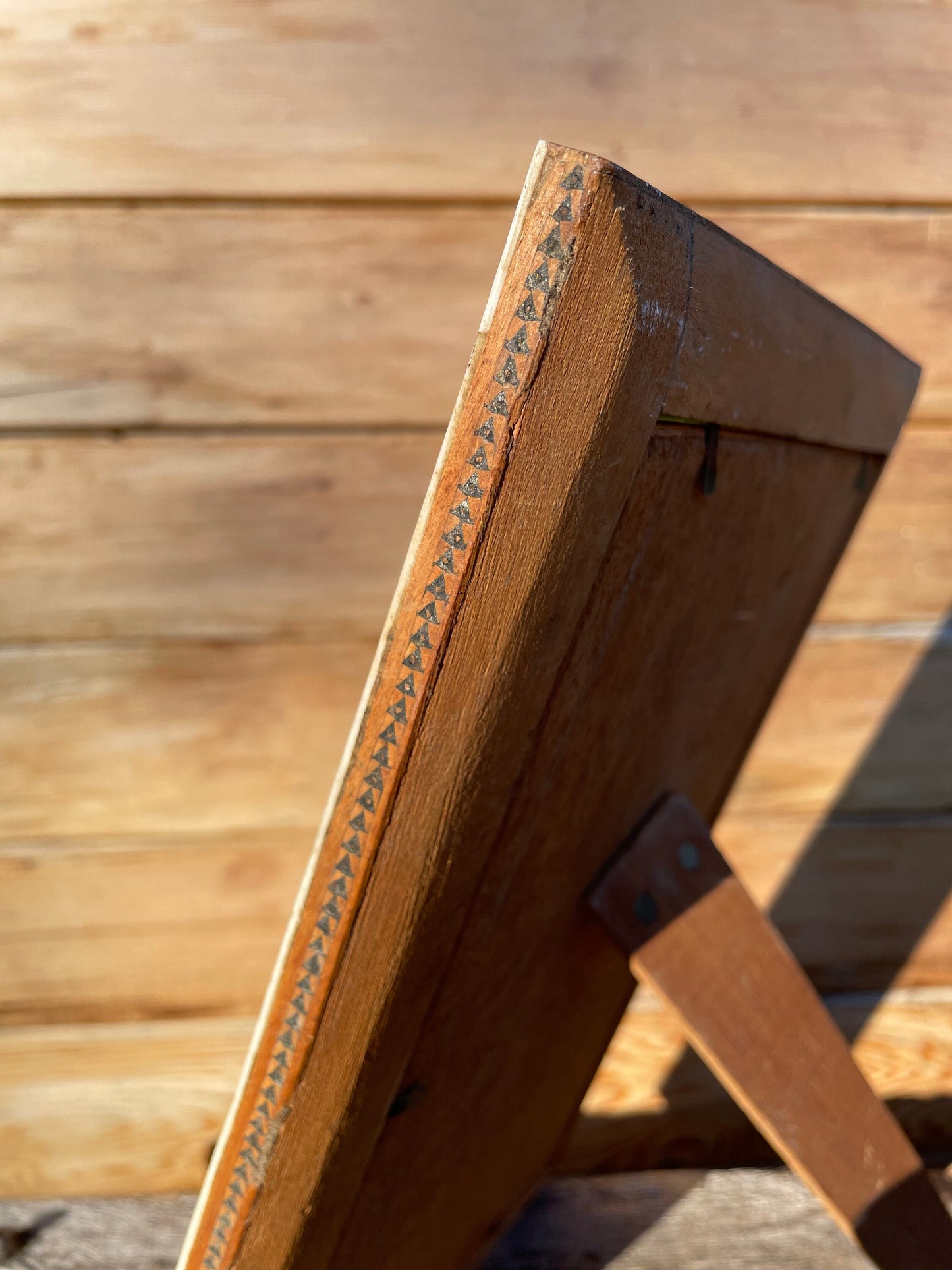 A Persian Hand Painted Panel With two Figures Housed in a Vizagapatam Style Easel Frame 31.5cm Tall