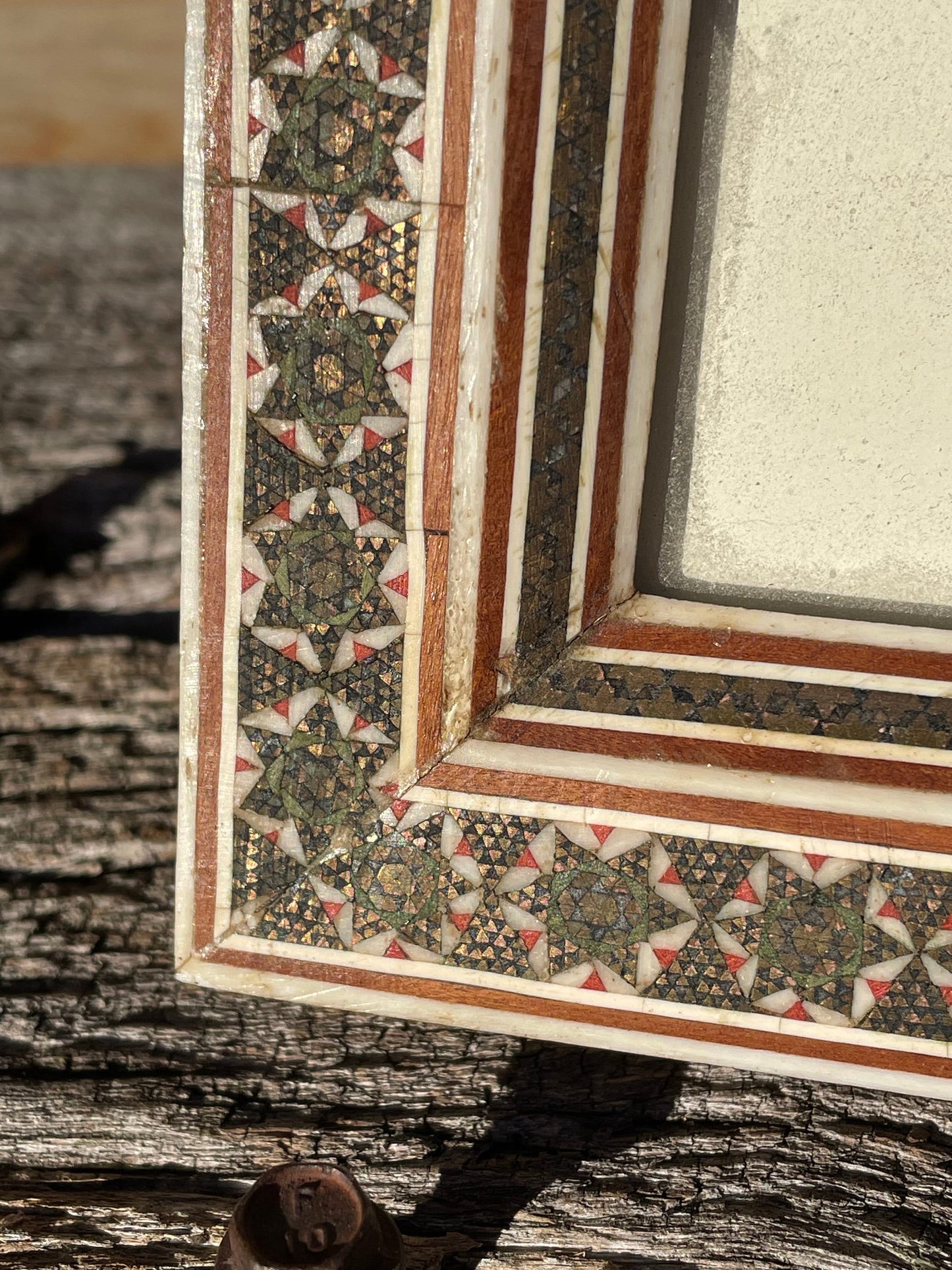 A Persian Hand Painted Panel With two Figures Housed in a Vizagapatam Style Easel Frame 31.5cm Tall