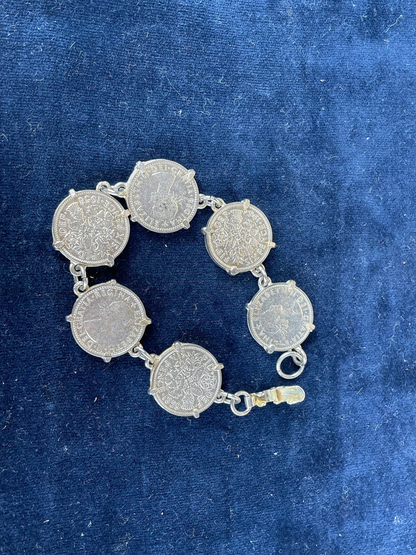 A Child's Charm Bracelet Made From Six Old Sixpence Coins 50's and 60's