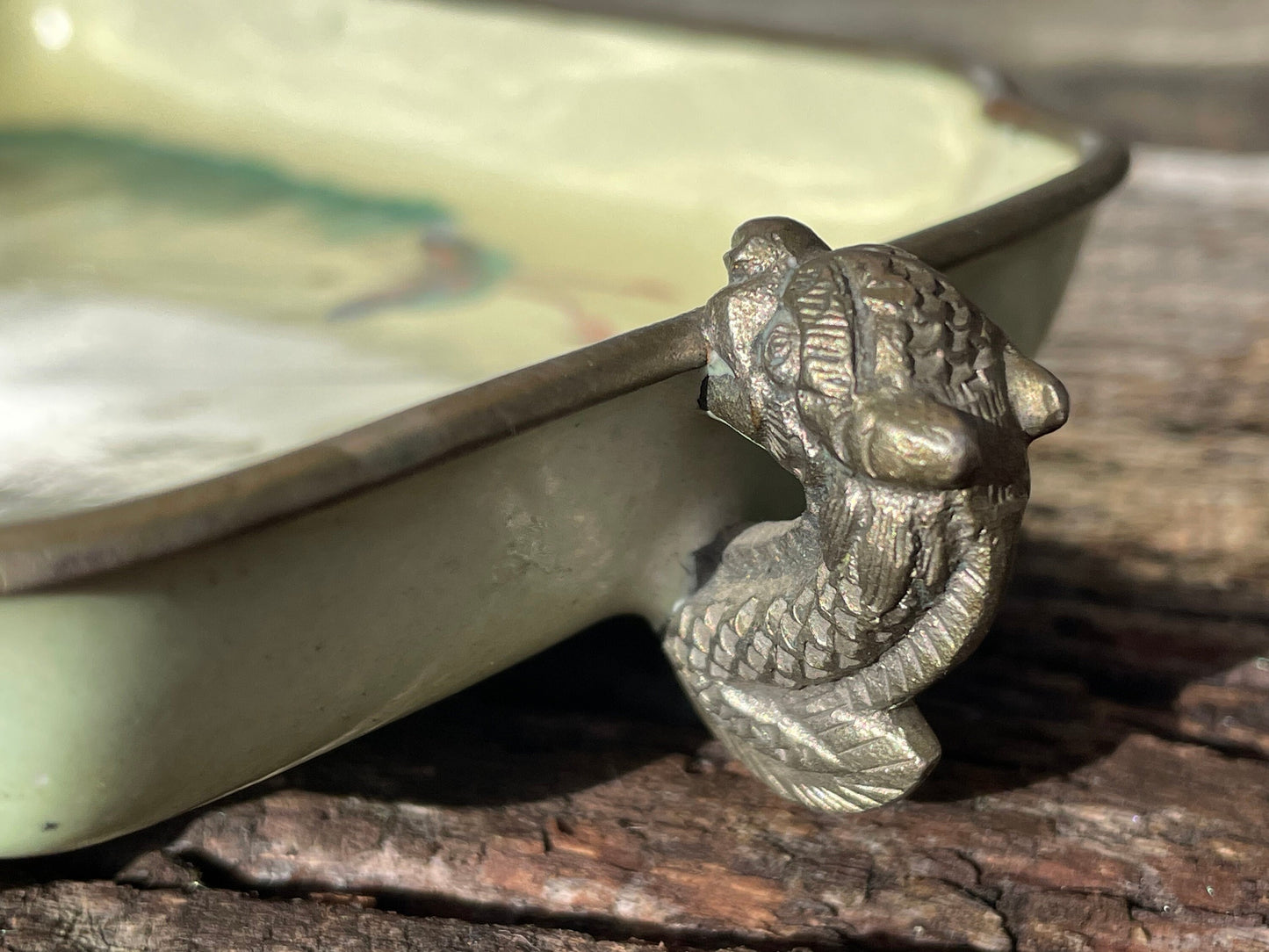 An antique hand painted Chinese enamel decorated pin tray with dragon handles 18cm wide c1900
