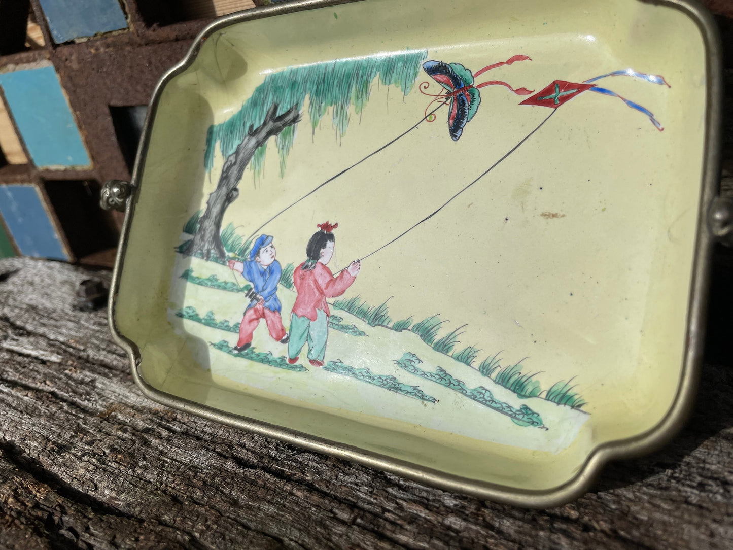 An antique hand painted Chinese enamel decorated pin tray with dragon handles 18cm wide c1900