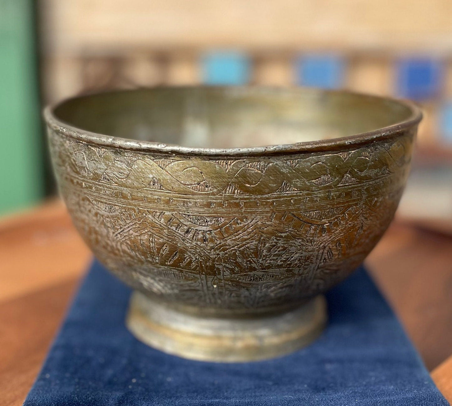 An antique Middle Eastern Bowl - heavily engraved and patinated with clear marks to base 16.5cm diameter