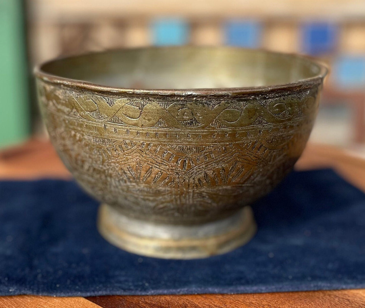 An antique Middle Eastern Bowl - heavily engraved and patinated with clear marks to base 16.5cm diameter