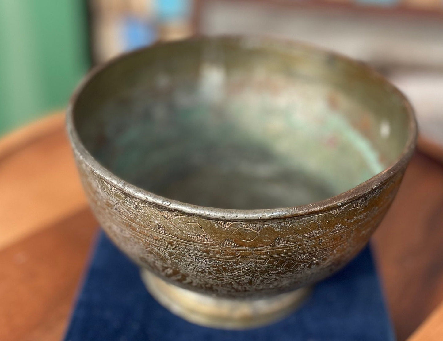 An antique Middle Eastern Bowl - heavily engraved and patinated with clear marks to base 16.5cm diameter