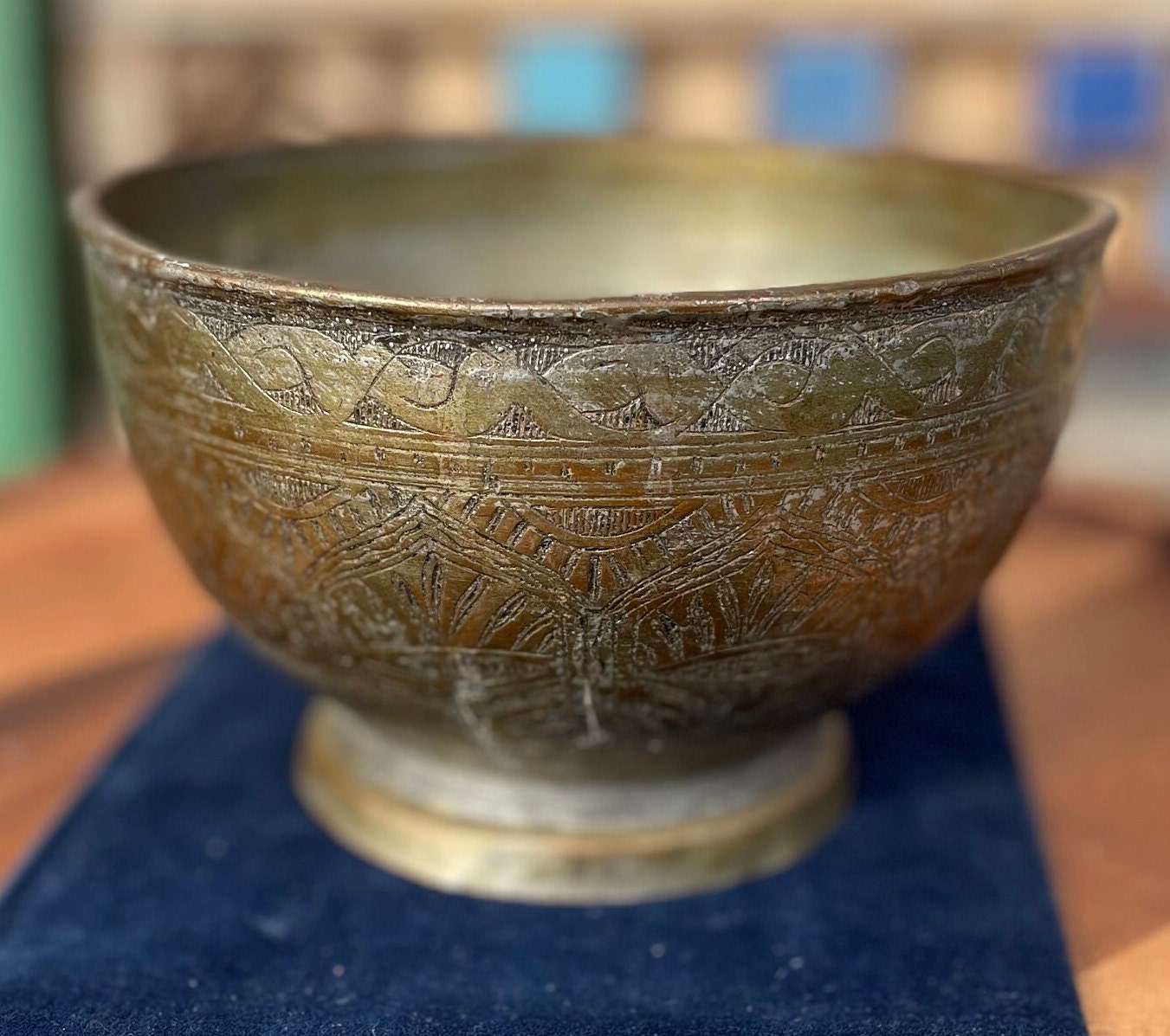 An antique Middle Eastern Bowl - heavily engraved and patinated with clear marks to base 16.5cm diameter
