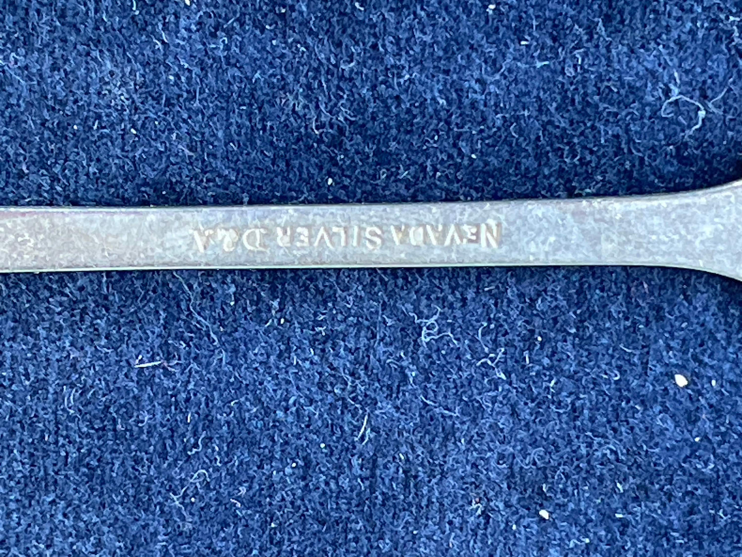 A fully marked Nevada silver by Daniel and Arter Ltd spoon 14cm long