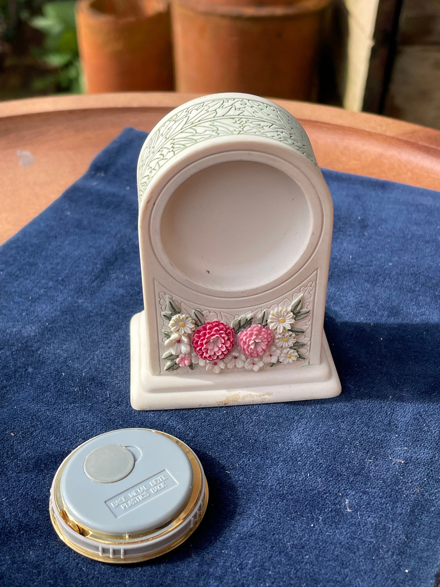 A miniature ceramic art nouveau style Mantel Clock 8cm tall