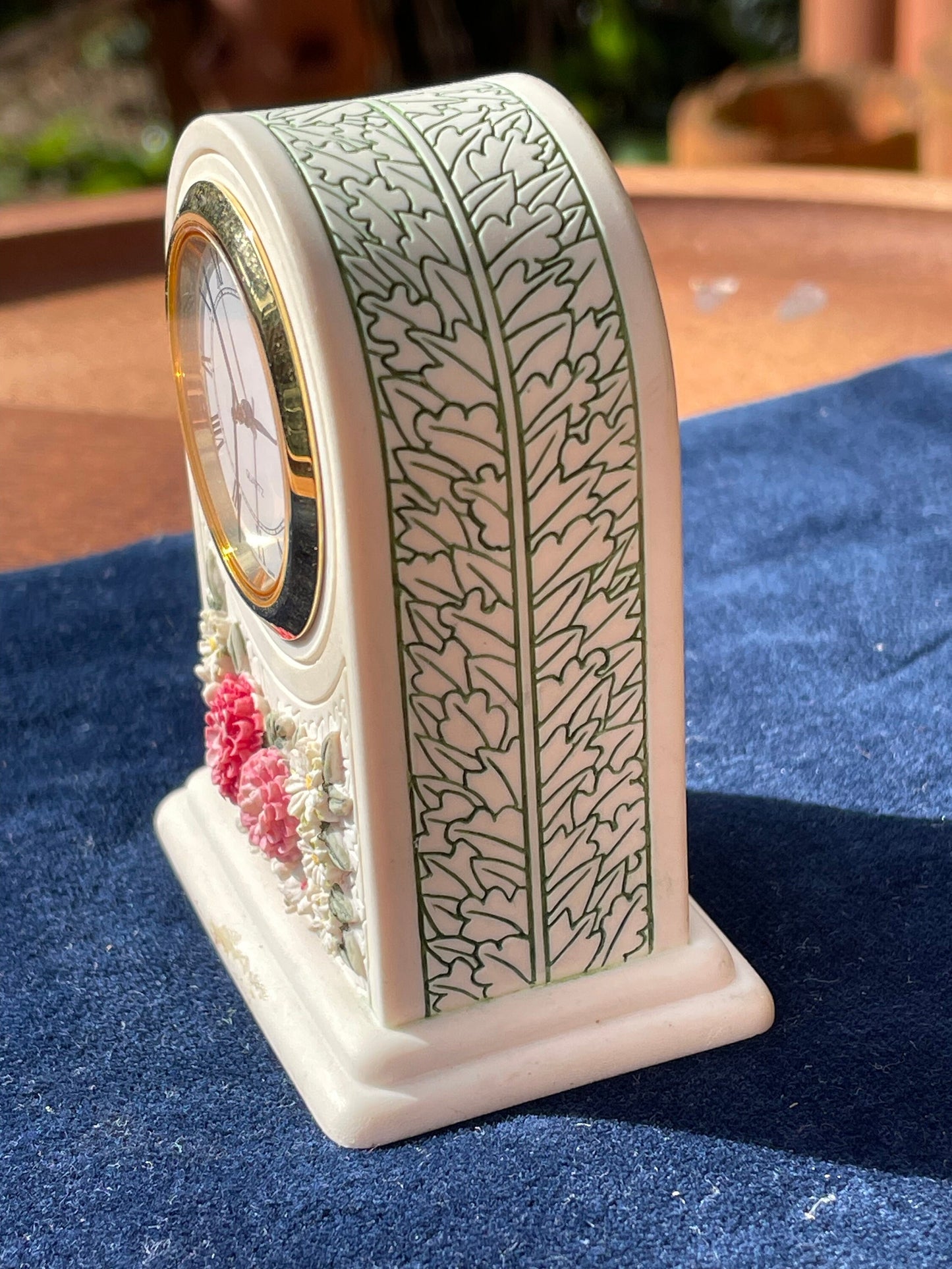 A miniature ceramic art nouveau style Mantel Clock 8cm tall