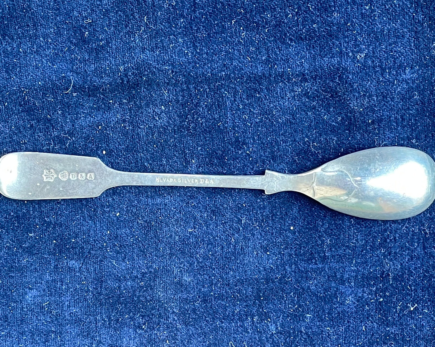 A fully marked Nevada silver by Daniel and Arter Ltd spoon 14cm long