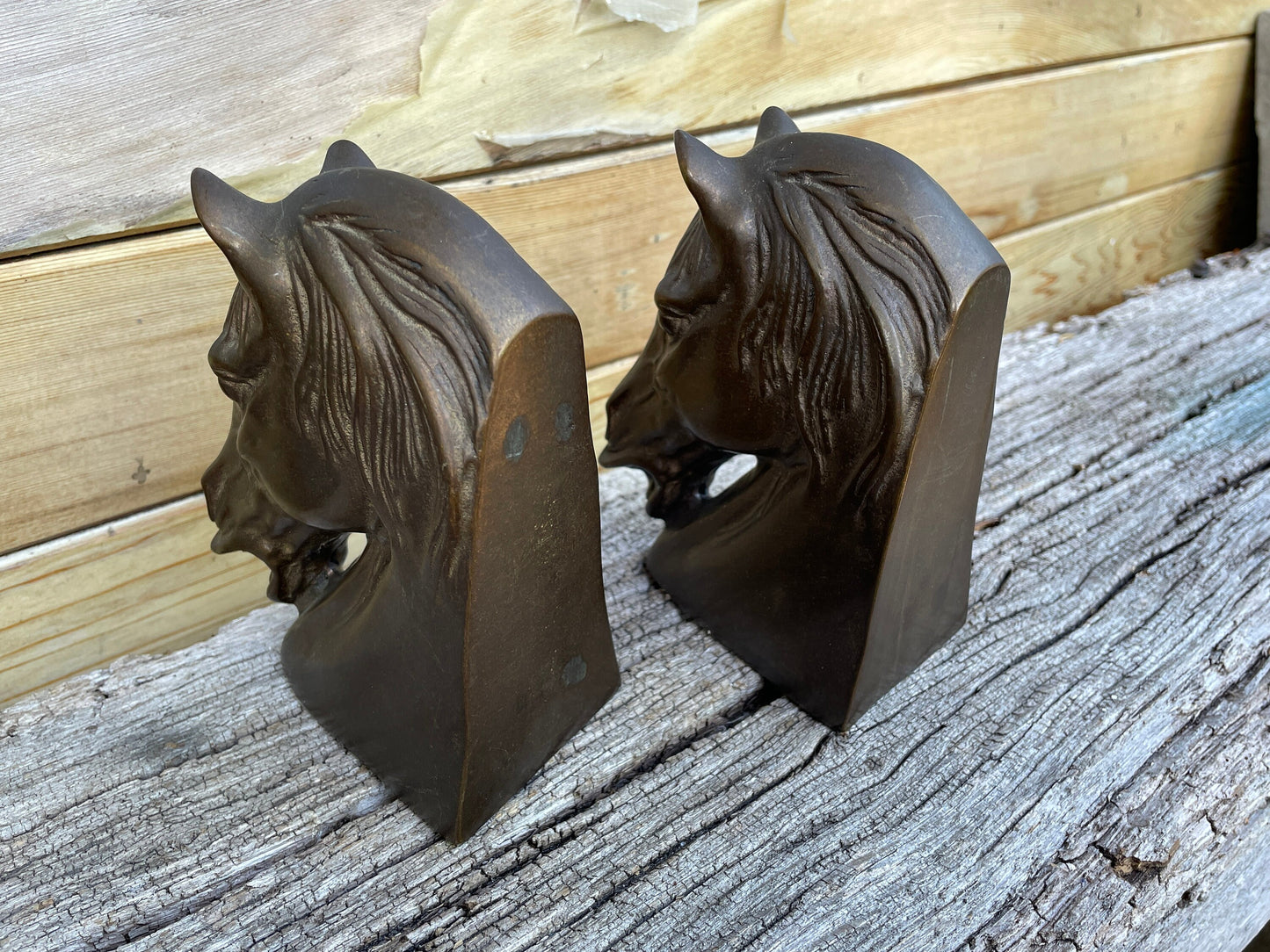 Two Bronze horse head sculptures 14cm tall