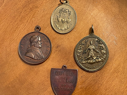Set of Four Antique Catholic Medals – Pius IX, Our Lady of Ransom, Sacred Heart & Our Lady of Mount Carmel, c.1870–1920