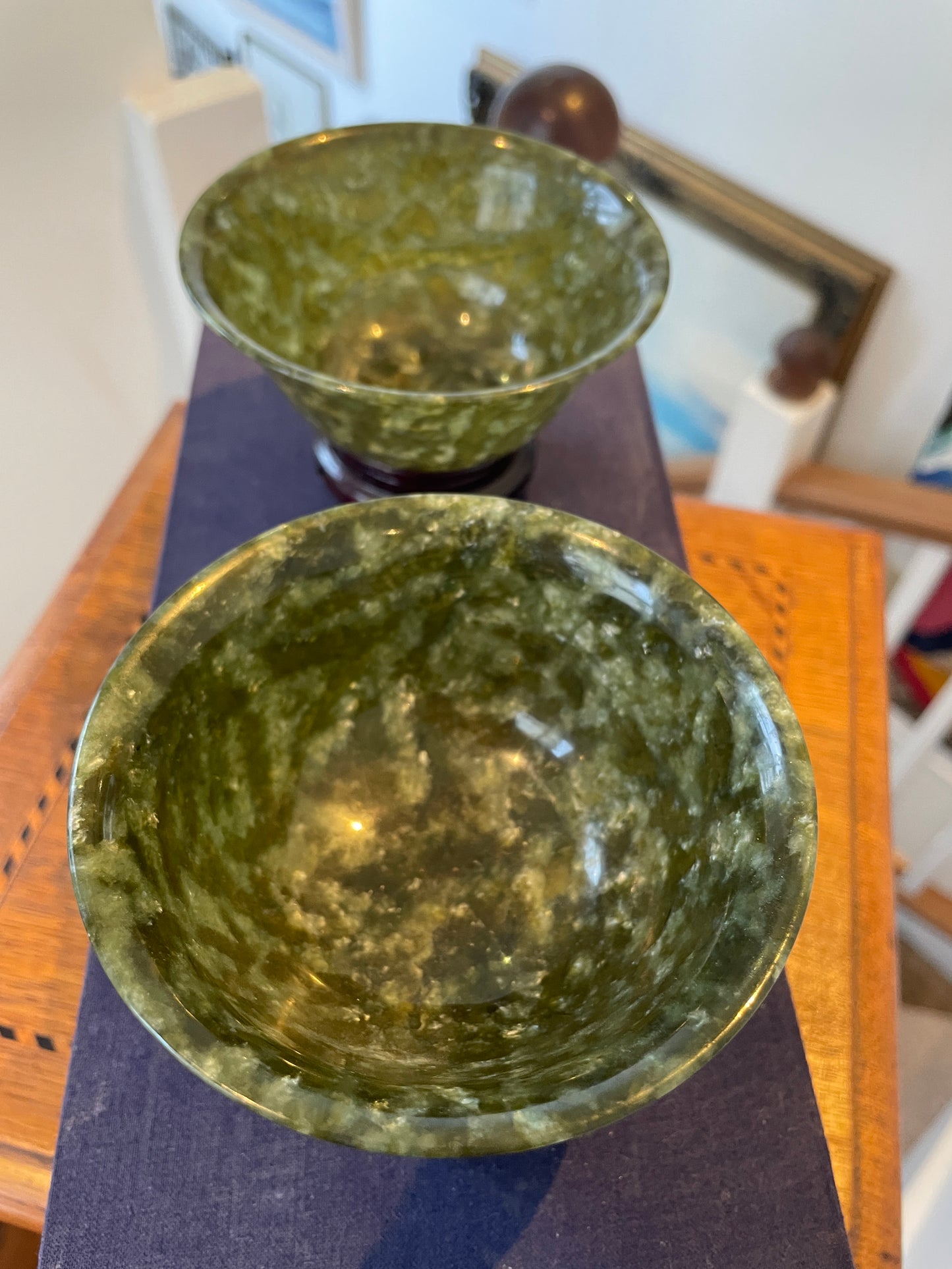 Antique Chinese Jade Bowls – Pair of Polished Spinach-Green Jade Cups on Hardwood Stands (c.20th Century)