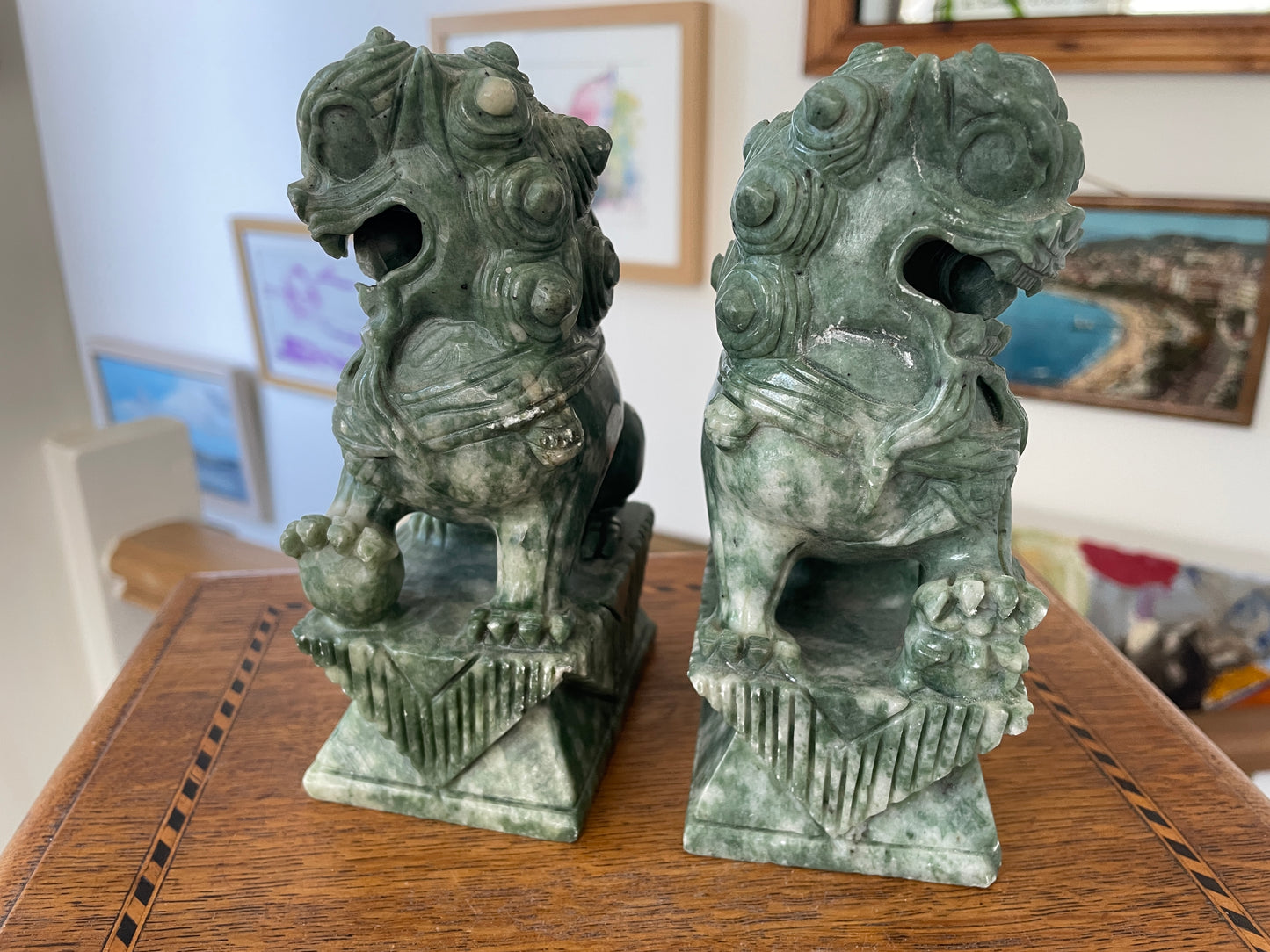 Chinese Green Hardstone Guardian Lions – Hand-Carved Pair with Rotating Ball (c.20th Century)
