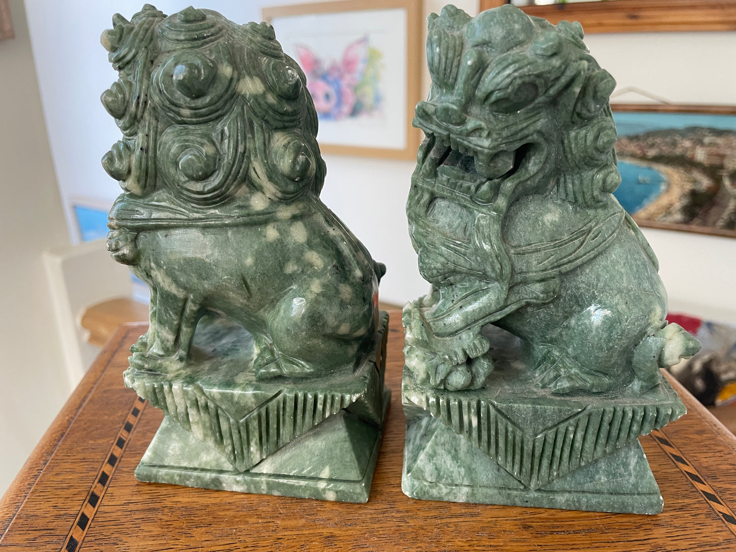 Chinese Green Hardstone Guardian Lions – Hand-Carved Pair with Rotating Ball (c.20th Century)