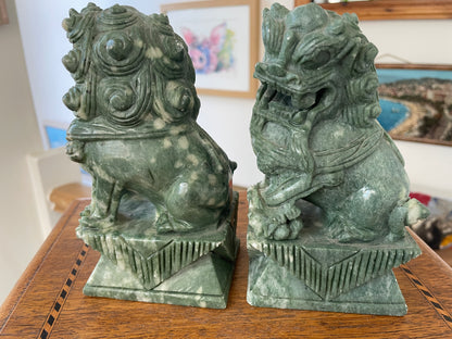 Chinese Green Hardstone Guardian Lions – Hand-Carved Pair with Rotating Ball (c.20th Century)