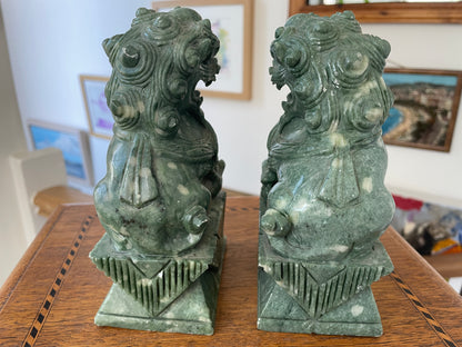 Chinese Green Hardstone Guardian Lions – Hand-Carved Pair with Rotating Ball (c.20th Century)
