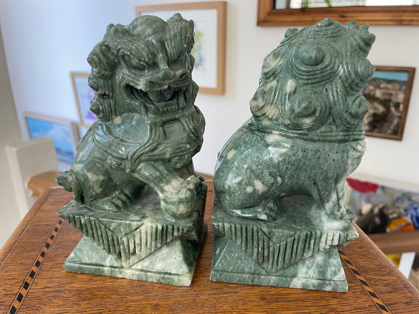 Chinese Green Hardstone Guardian Lions – Hand-Carved Pair with Rotating Ball (c.20th Century)