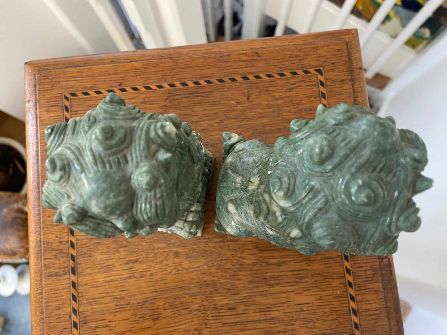 Chinese Green Hardstone Guardian Lions – Hand-Carved Pair with Rotating Ball (c.20th Century)