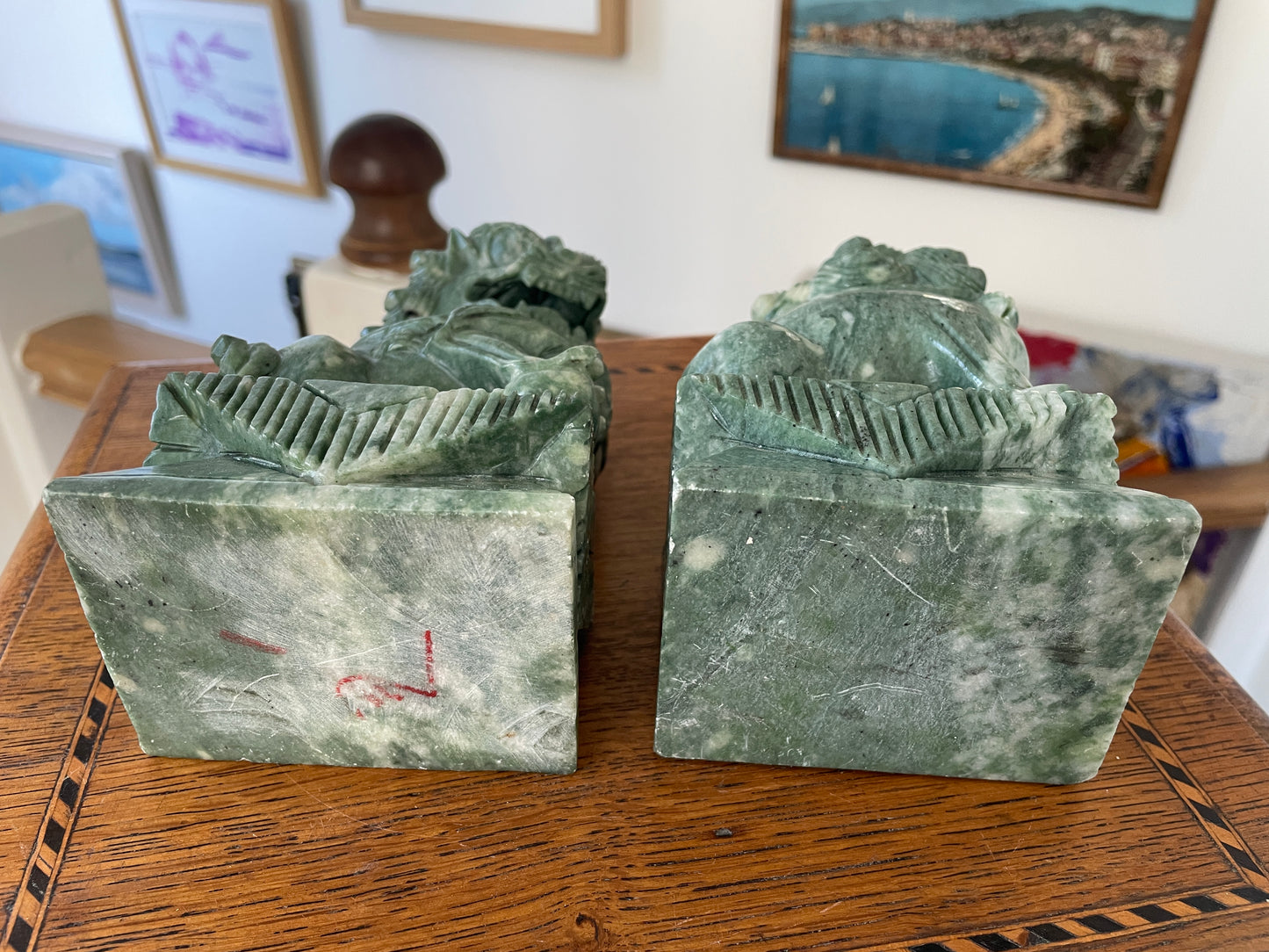 Chinese Green Hardstone Guardian Lions – Hand-Carved Pair with Rotating Ball (c.20th Century)