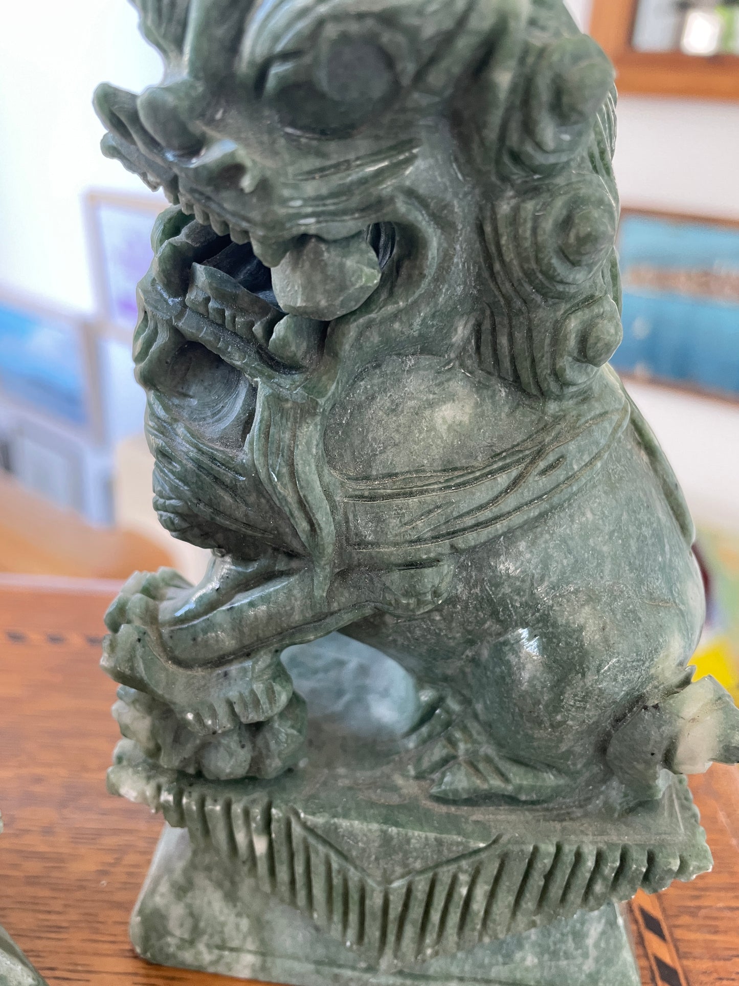 Chinese Green Hardstone Guardian Lions – Hand-Carved Pair with Rotating Ball (c.20th Century)
