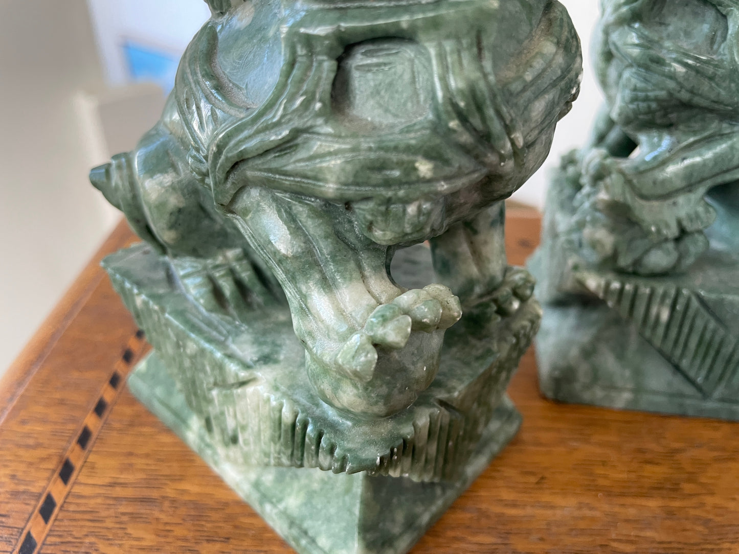 Chinese Green Hardstone Guardian Lions – Hand-Carved Pair with Rotating Ball (c.20th Century)