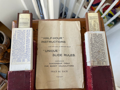 Antique English “Unique” Universal Slide Rules – Boxed Pair with Original Instructions (c.1930s–1950s)