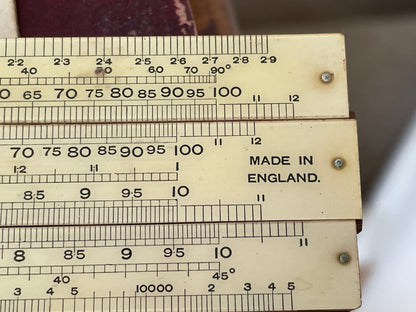 Antique English “Unique” Universal Slide Rules – Boxed Pair with Original Instructions (c.1930s–1950s)