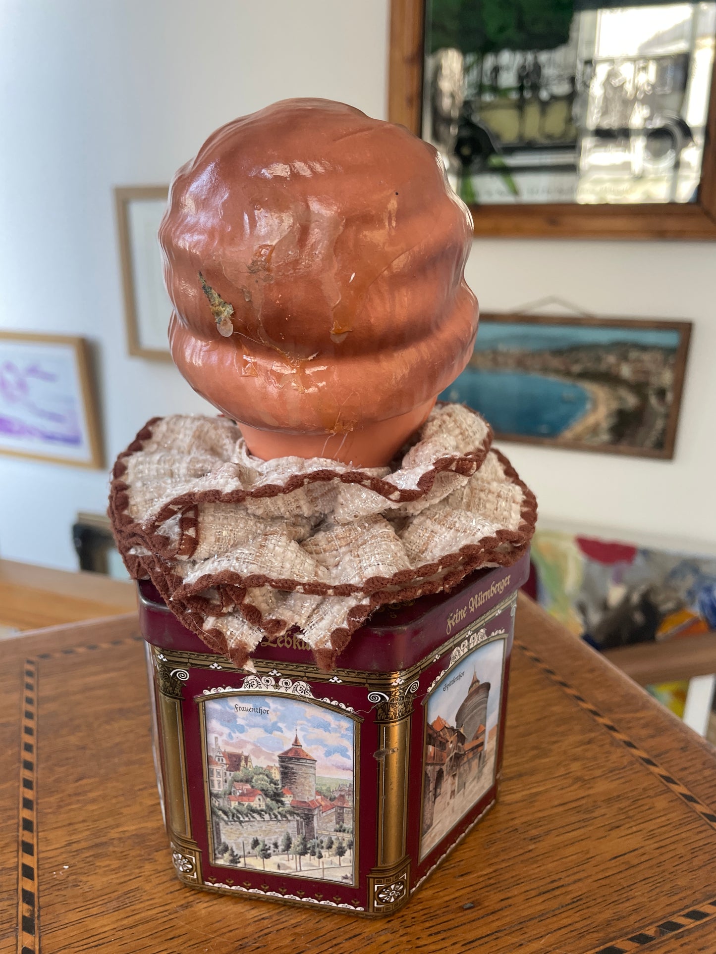 Vintage German “Feine Nürnberger” Tin with Doll Bust Lid & Hidden Miniature Doll –Folk Art Novelty Curio (c.1950s–1970s)