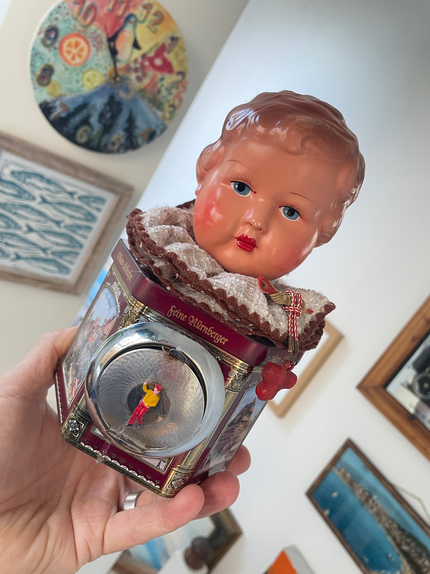 Vintage German “Feine Nürnberger” Tin with Doll Bust Lid & Hidden Miniature Doll –Folk Art Novelty Curio (c.1950s–1970s)