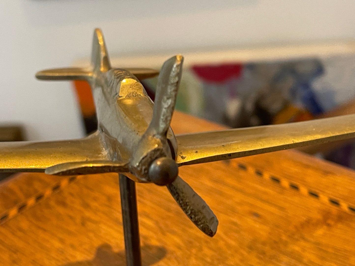 Antique British Brass Spitfire Model – Cast Desktop Aircraft on Starburst Base (c.1940s–50s)