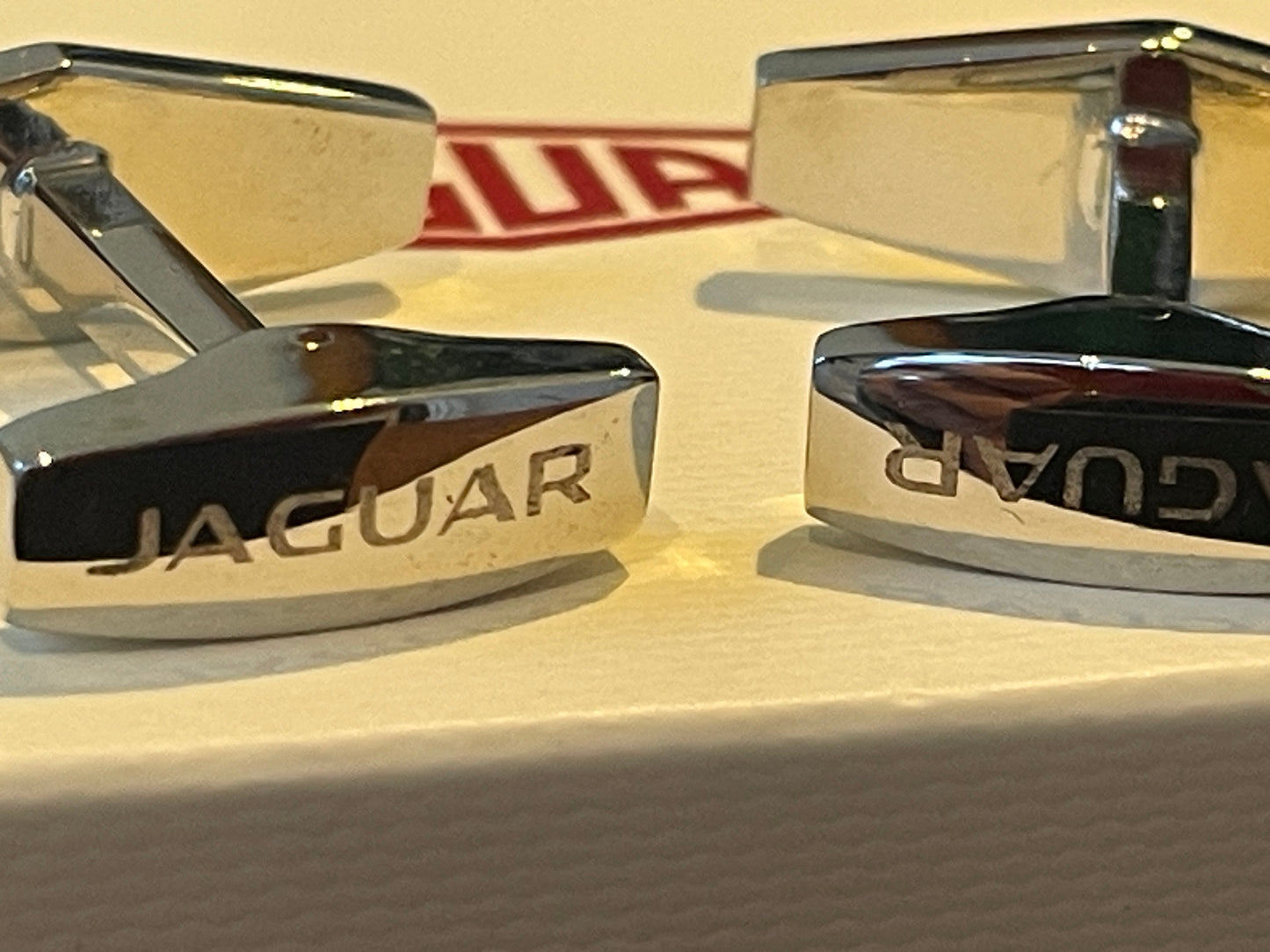 Jaguar Branded Cufflinks – Chrome Finish with Black Enamel Logo, Original Presentation Box (c. late 20th century)