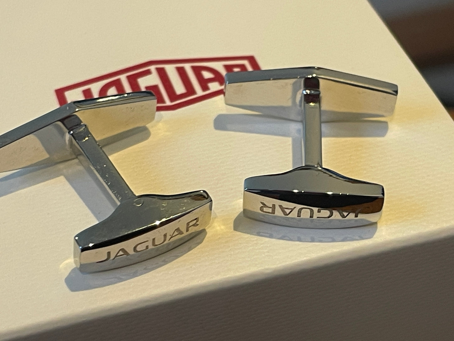 Jaguar Branded Cufflinks – Chrome Finish with Black Enamel Logo, Original Presentation Box (c. late 20th century)