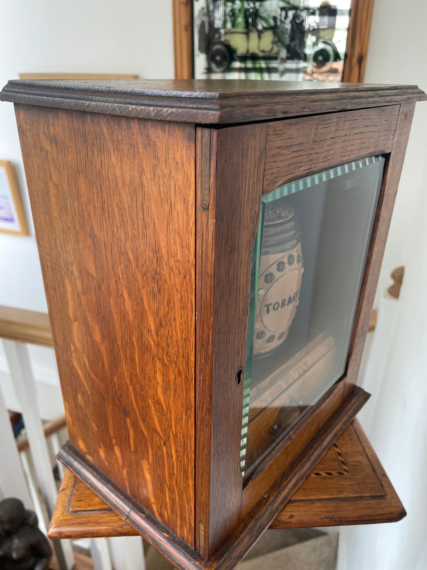 Antique Oak Smokers Cabinet with Bevelled Glass Door and Royal Doulton Lambeth Tobacco Jar (c.1900–1920)