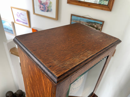 Antique Oak Smokers Cabinet with Bevelled Glass Door and Royal Doulton Lambeth Tobacco Jar (c.1900–1920)