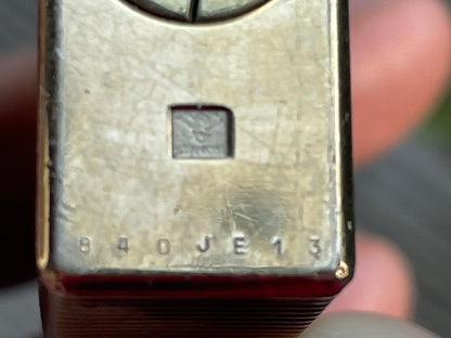 French S.T. Dupont gilt Parisian lighter hand stamped serial no. 84DJE13 in original box