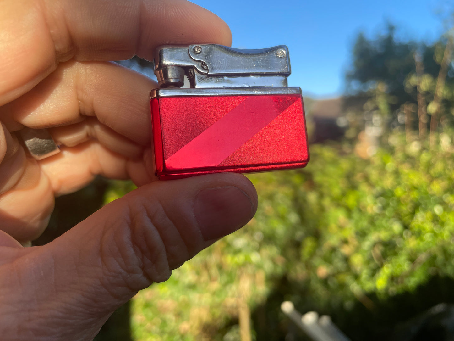 Vintage red gas lighter Sunflower brand - chrome- 43mm wide