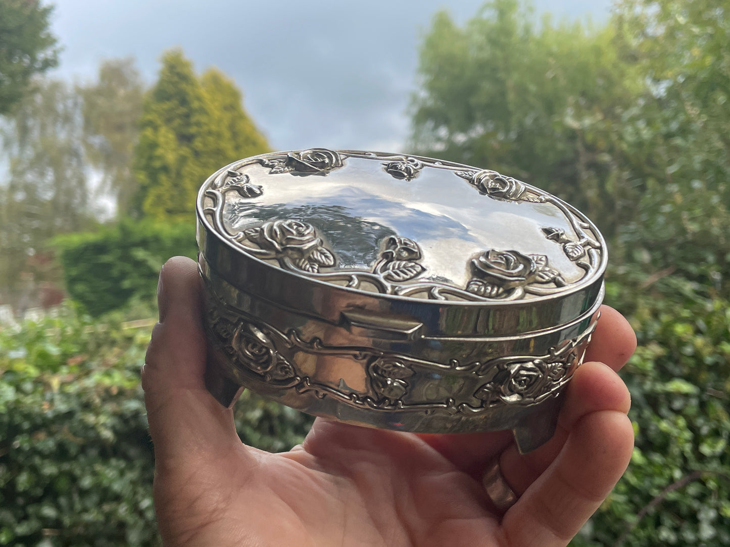 Silver trinket box-floral embossed hinged jewellery casket 11cm wide 313g