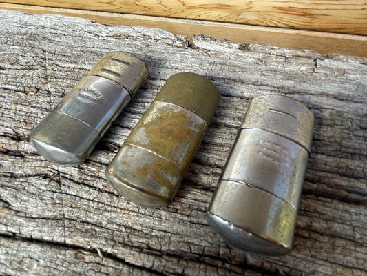 Three English Tommy petrol lighters spares and repairs