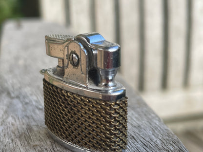 Small petrol lighter called Happy with a chain mail design body 2.5cm wide