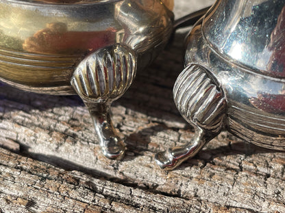 Silver plated cruet set with cobalt blue glass liners and triangular tray