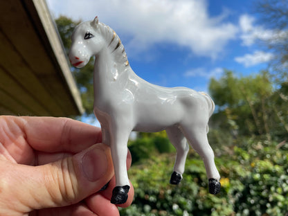 Early 20th century hand finished ceramic white horse