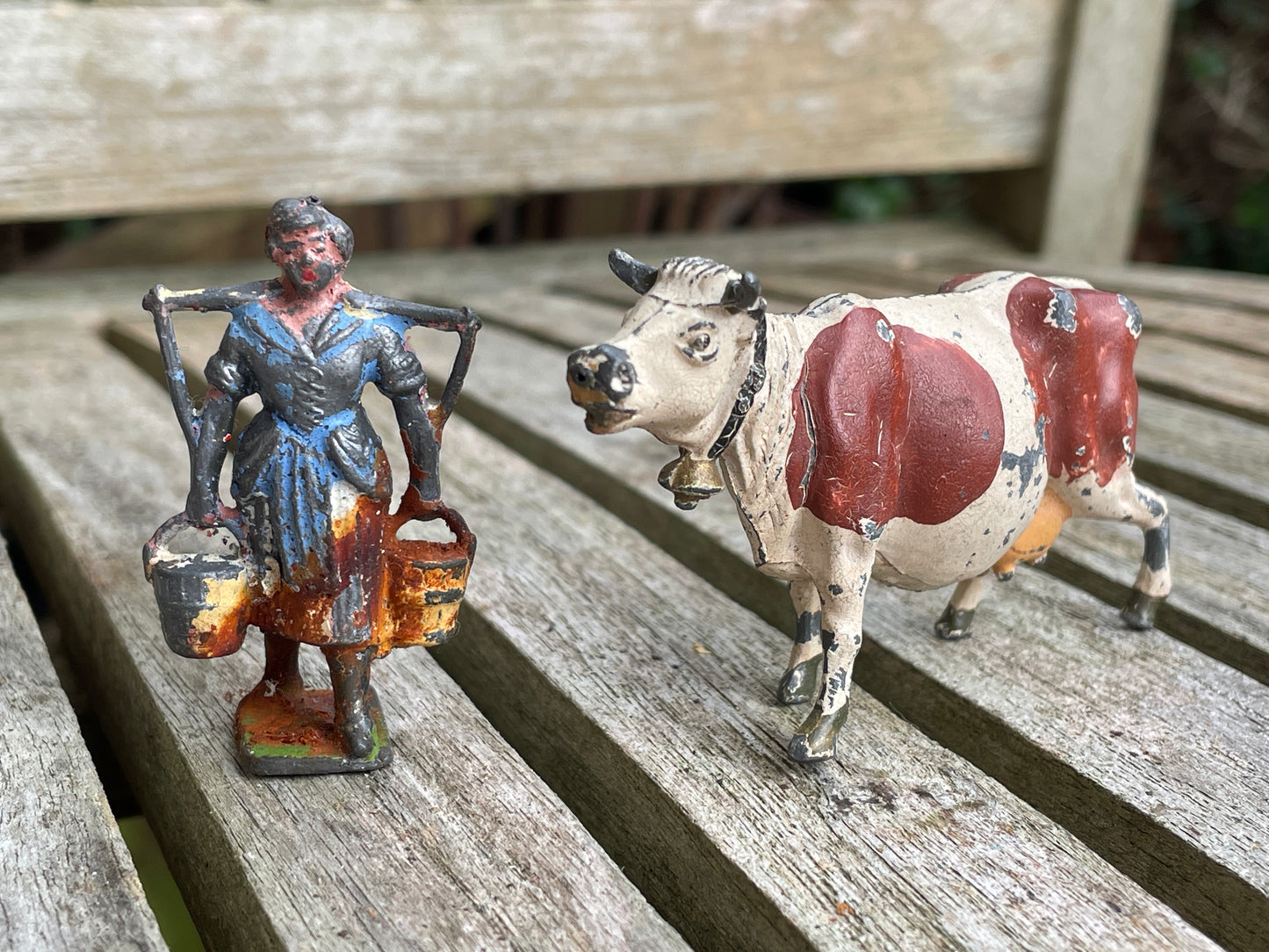 Antique Hand Painted Diecast Metal/Lead scale models of a cow and milkmaid by Johillco