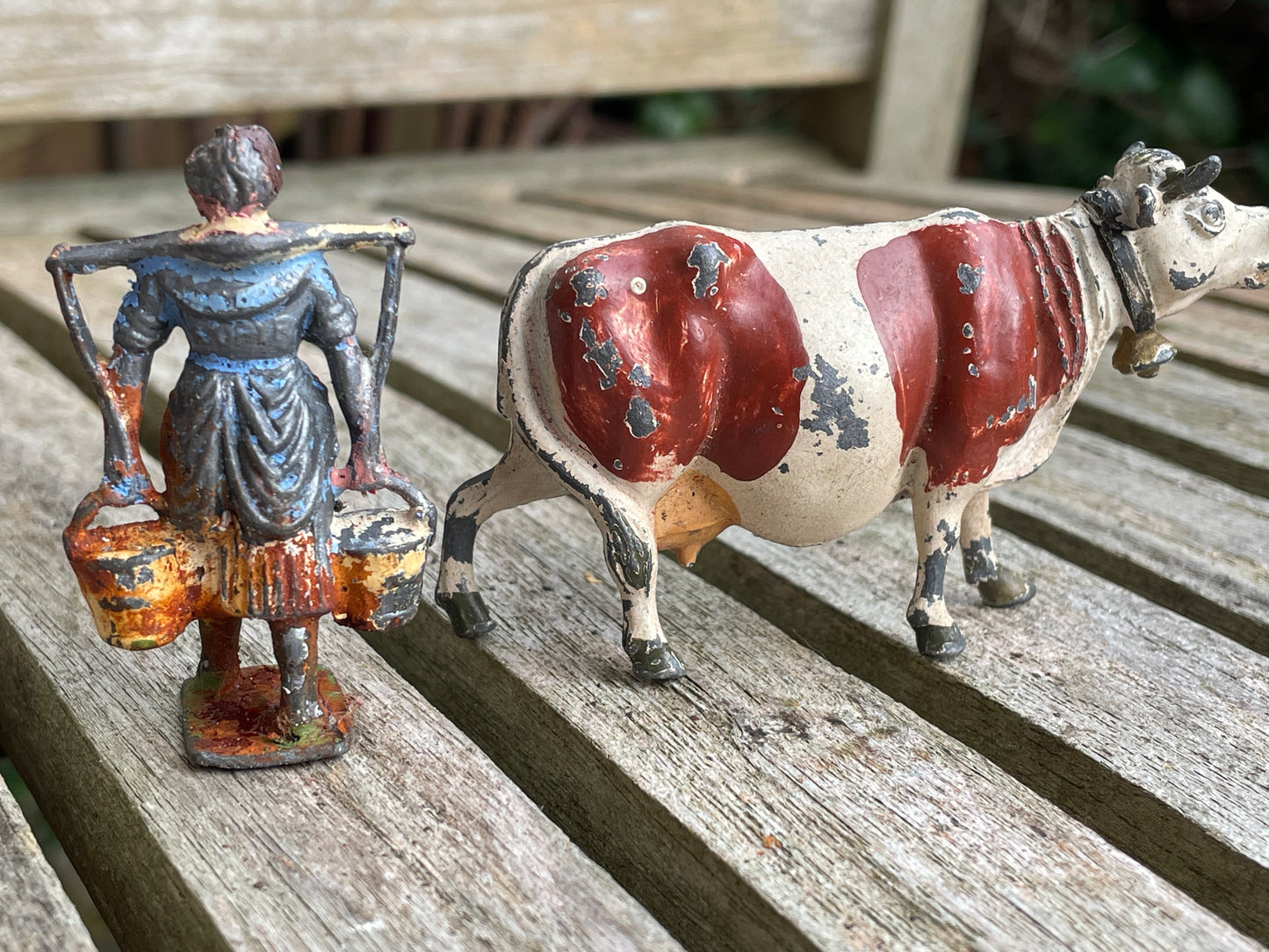 Antique Hand Painted Diecast Metal/Lead scale models of a cow and milkmaid by Johillco