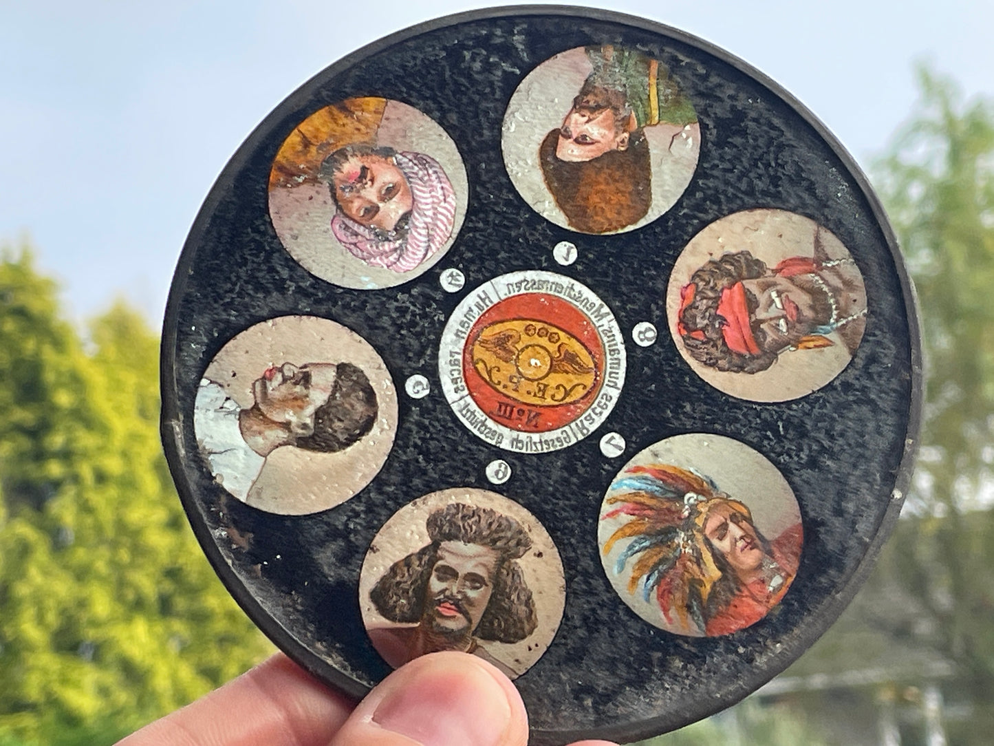 Two Victorian glass disc magic lantern colour slides