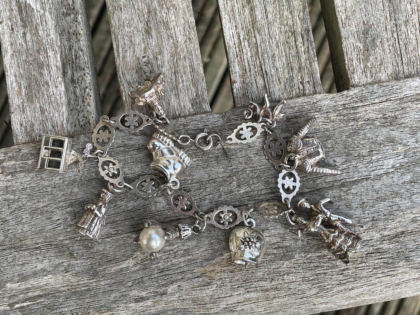 Charm bracelet some marked 800 silver 26g