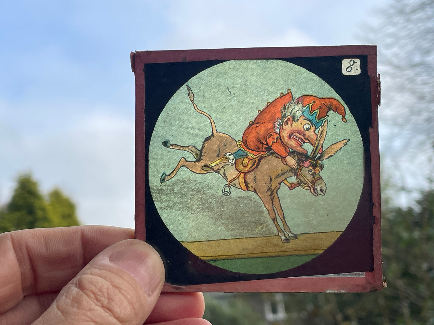 Four Victorian glass disc magic lantern colour slides