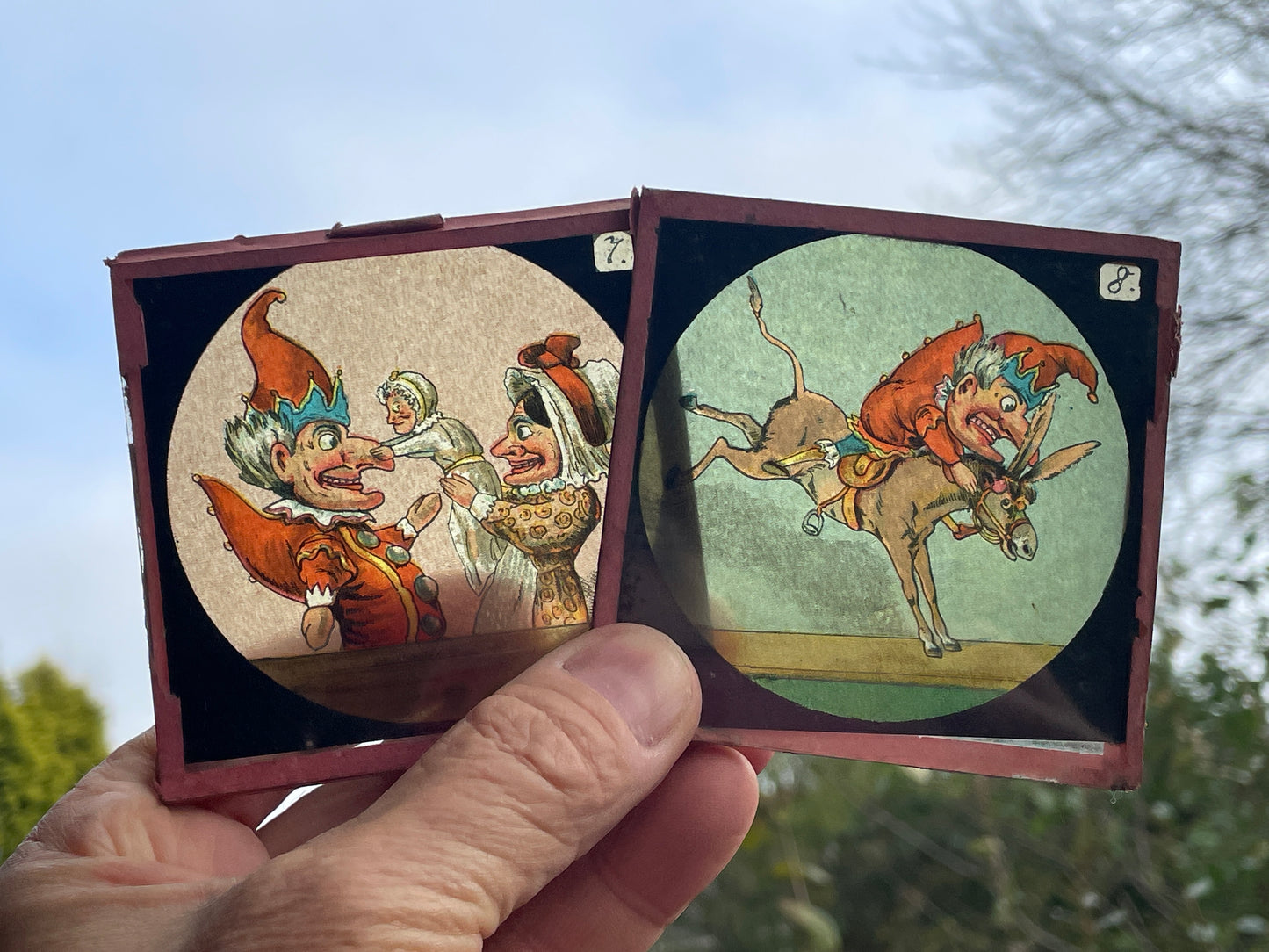 Four Victorian glass disc magic lantern colour slides